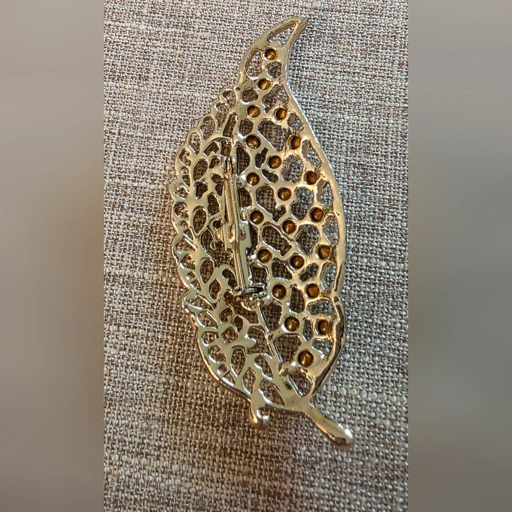 Vintage Gold Leaf Brooch With Light Blue Rhinestones.  Unsigned